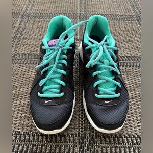 Nike Women's Black Athletic Shoes with Teal and Pink Accents